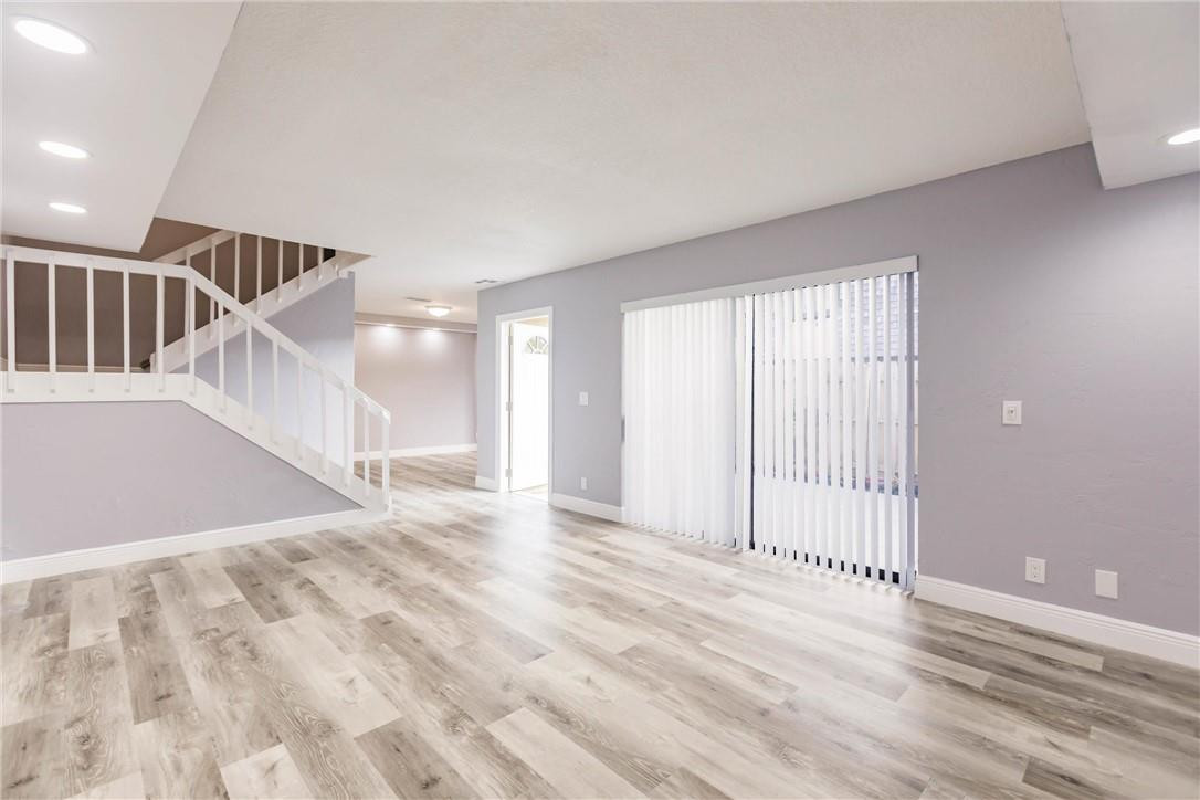 209 Woodland Road Palm Springs, FL 33461 - Photo 4 of 23 a view of entryway with wooden floor