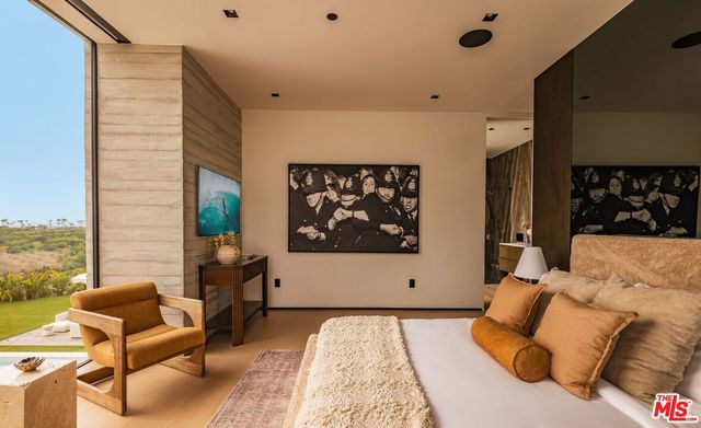 a bathroom with a double vanity sink and mirror