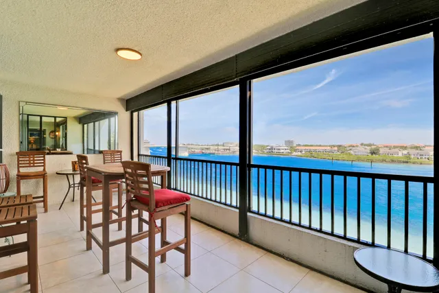 a view of a city with lawn chairs