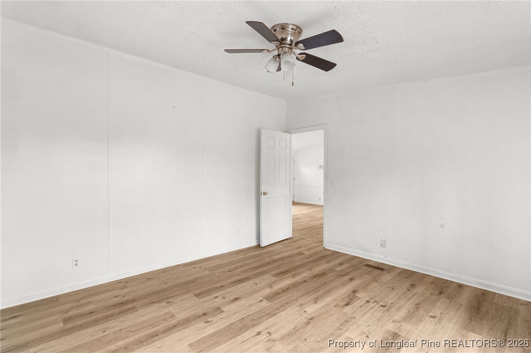 180 Branch Road Red Springs, NC 28377 - Photo 16 of 32 a view of empty room with wooden floor