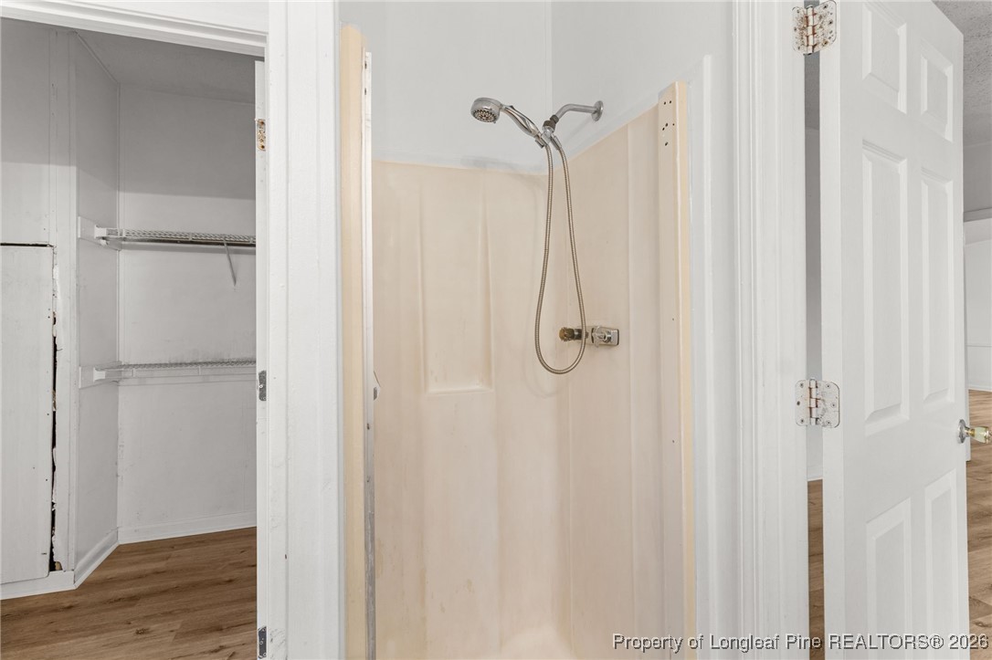180 Branch Road Red Springs, NC 28377 - Photo 18 of 32 a bathroom with a shower