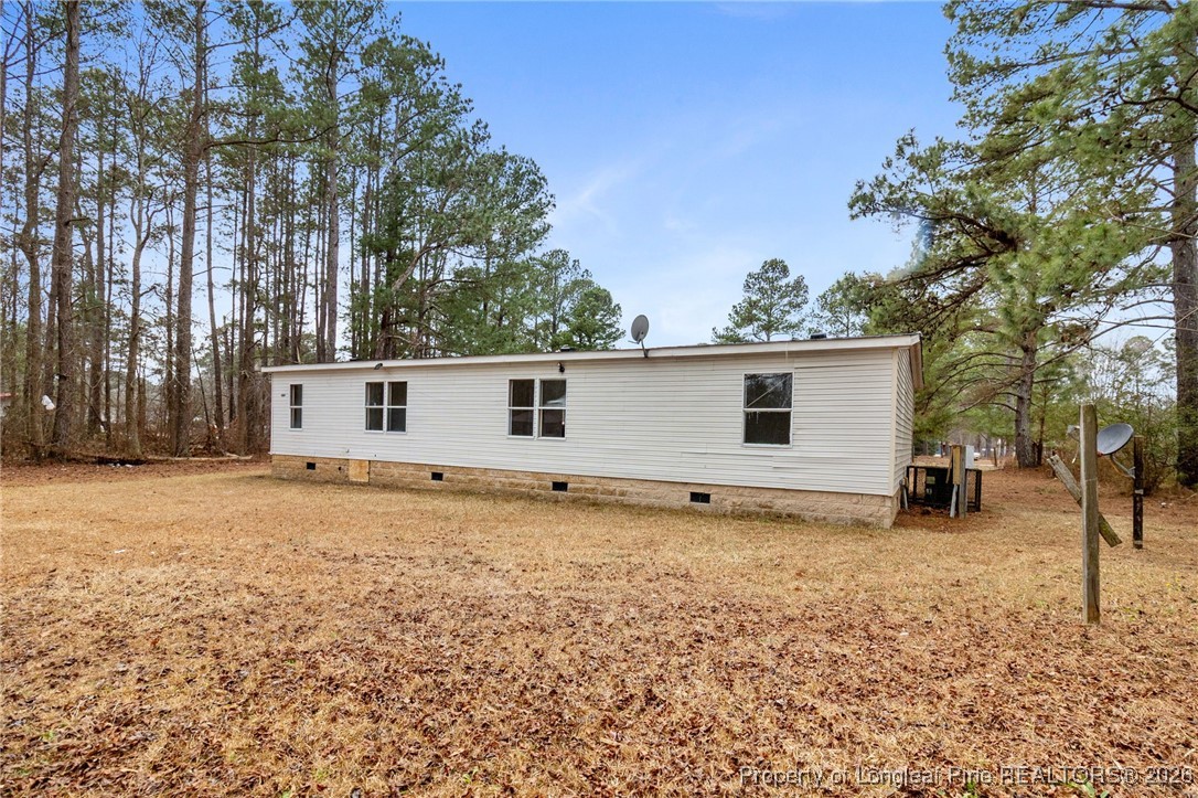180 Branch Road Red Springs, NC 28377 - Photo 31 of 32 a view of a house with a yard