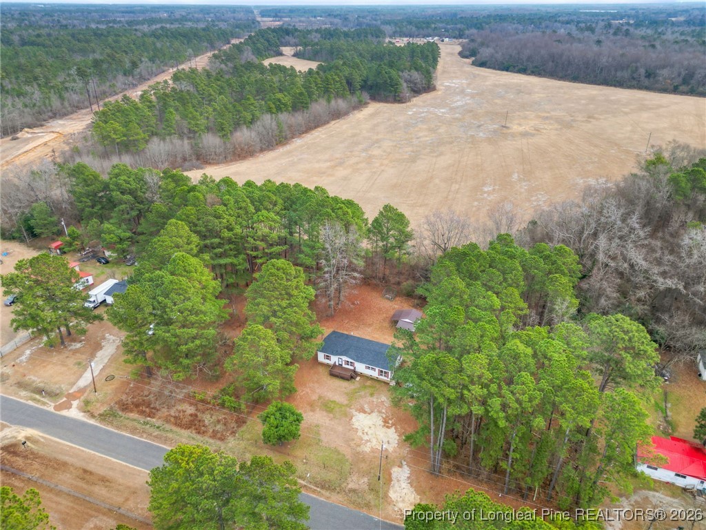 180 Branch Road Red Springs, NC 28377 - Photo 32 of 32 an aerial view of a houses with yard