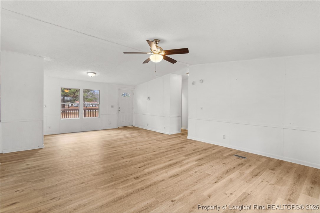 180 Branch Road Red Springs, NC 28377 - Photo 7 of 32 wooden floor in an empty room with a window