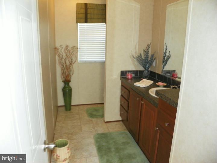 7283 Pearsons Corner Road Dover, DE 19904 - Photo 11 of 22 Bathroom