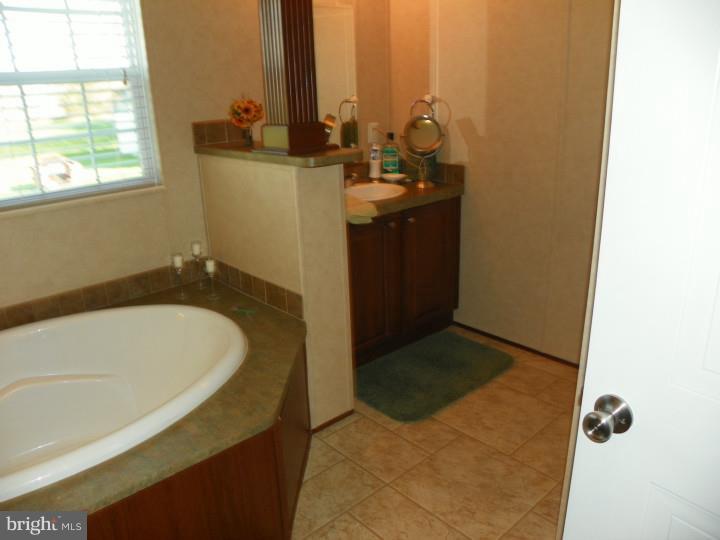 7283 Pearsons Corner Road Dover, DE 19904 - Photo 17 of 22 Master Bathroom