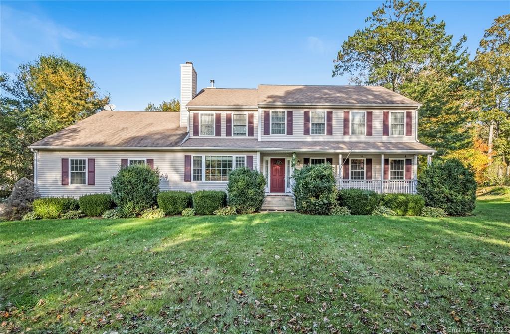 22 Partridge Road Warren, CT 06754 - Photo 1 of 1 a front view of a house with a yard