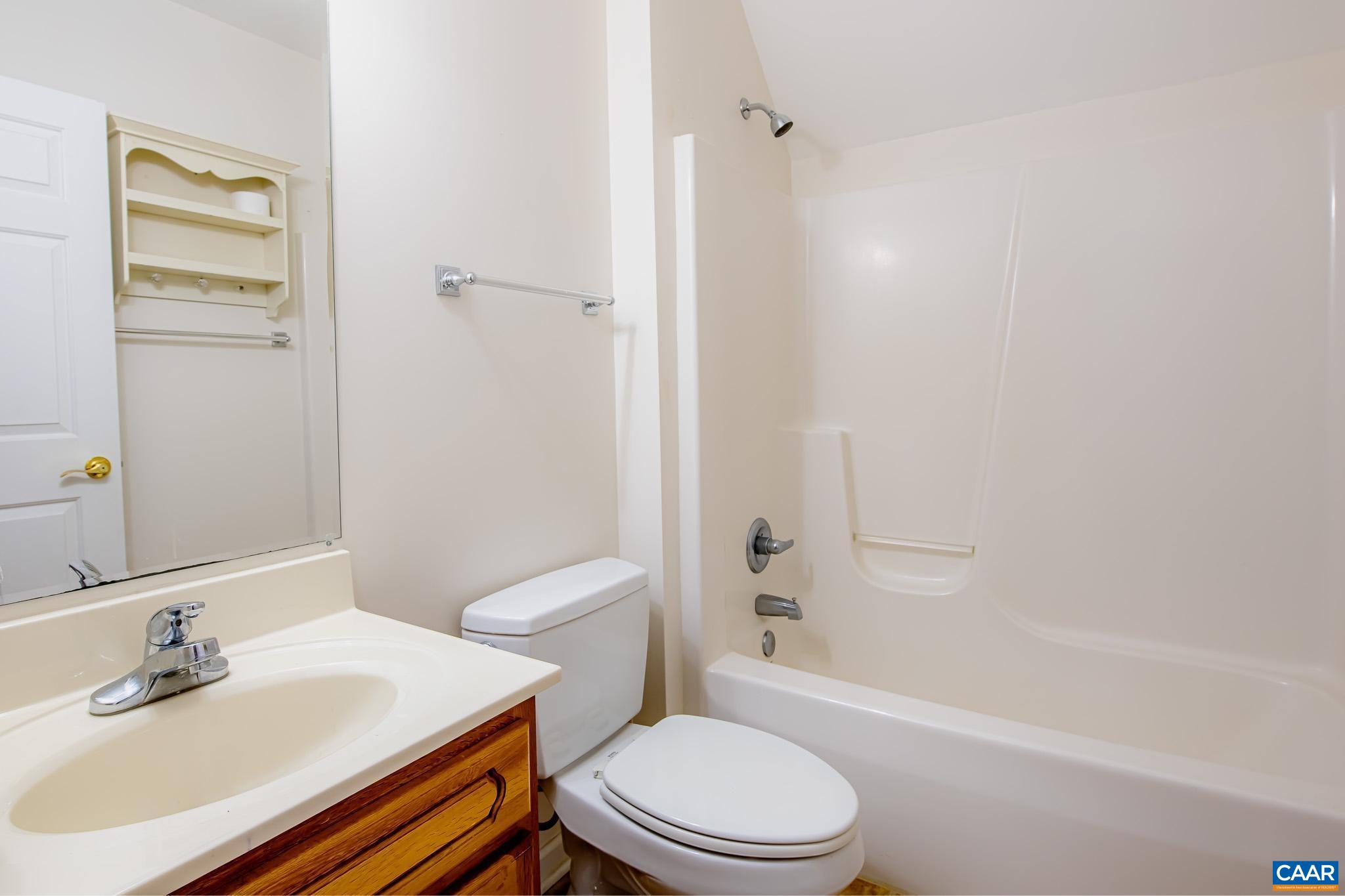 2644 Union Church Road Buckingham, VA 23921 - Photo 35 of 59 a bathroom with a sink toilet and shower