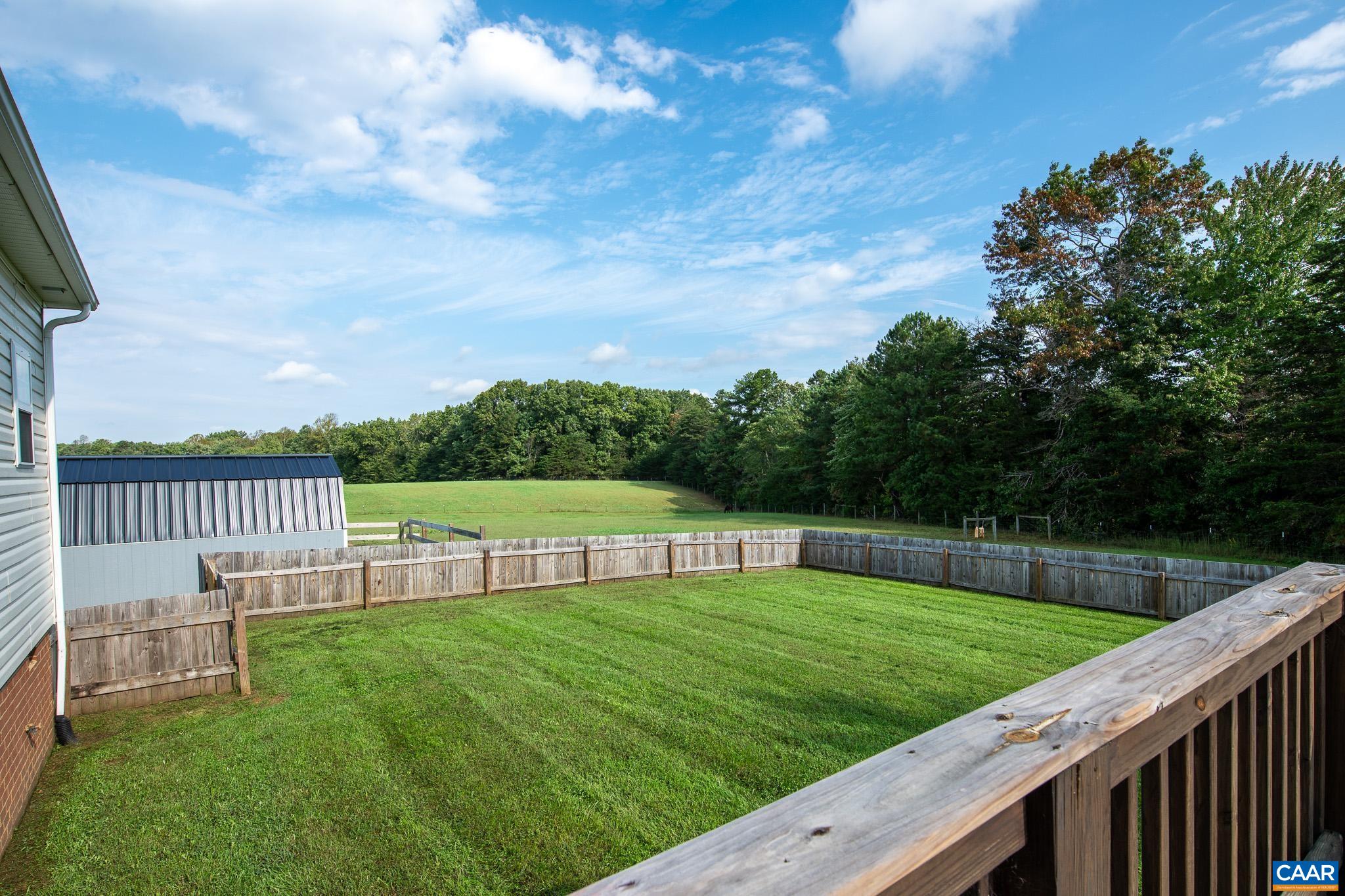 2644 Union Church Road Buckingham, VA 23921 - Photo 39 of 59 a view of a deck with a yard