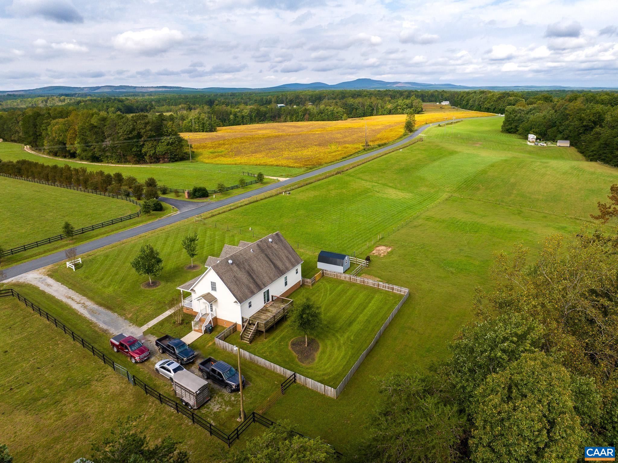 2644 Union Church Road Buckingham, VA 23921 - Photo 6 of 59 an aerial view of a house with a swimming pool