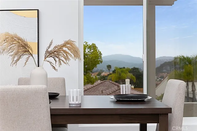 view of living room with furniture and a floor to ceiling window