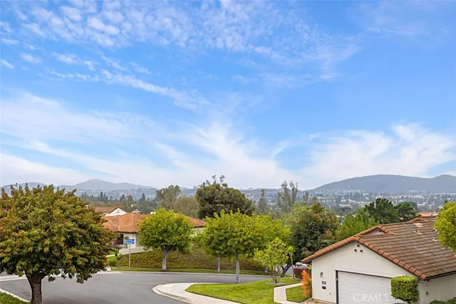 a view of a city with a building in the background