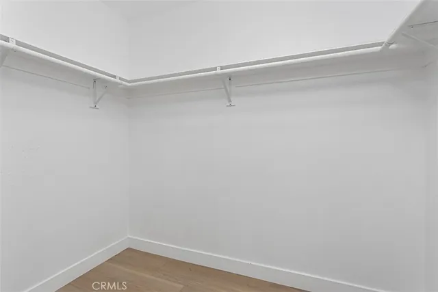 a view of an empty walk in closet