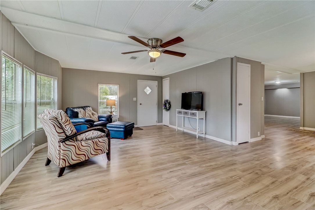 540821 Lem Turner Road Callahan, FL 32011 - Photo 13 of 35 a living room with furniture and a flat screen tv