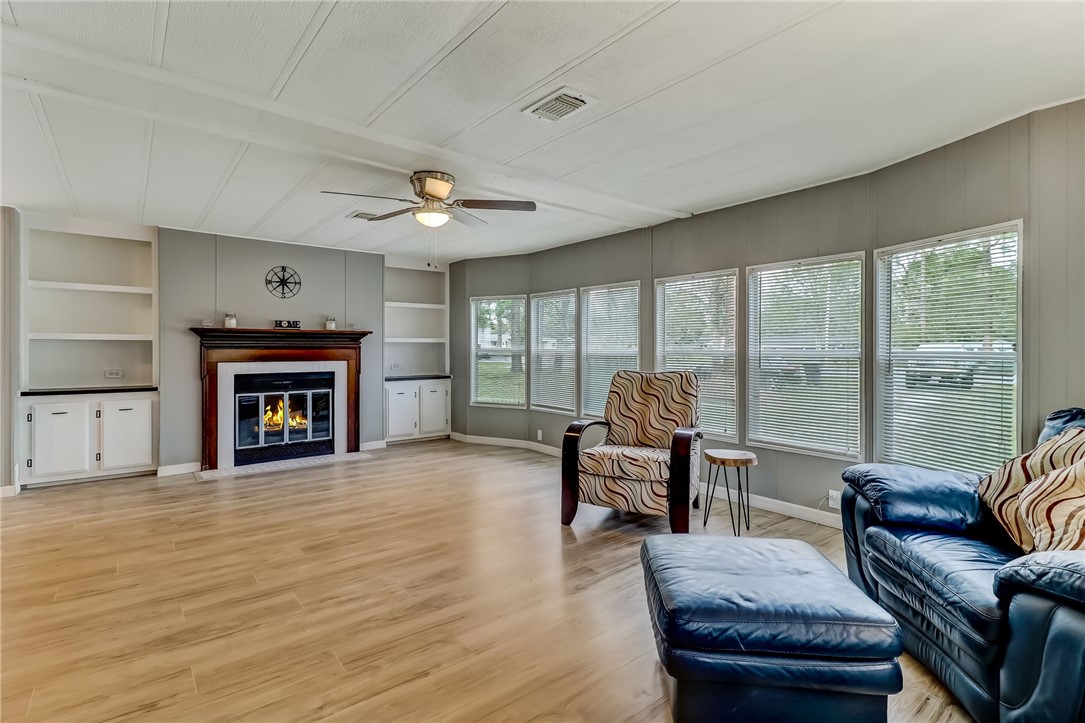 540821 Lem Turner Road Callahan, FL 32011 - Photo 3 of 35 a living room with furniture and a fireplace