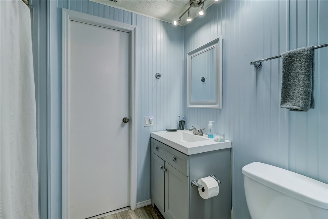 540821 Lem Turner Road Callahan, FL 32011 - Photo 31 of 35 a bathroom with a toilet sink and mirror
