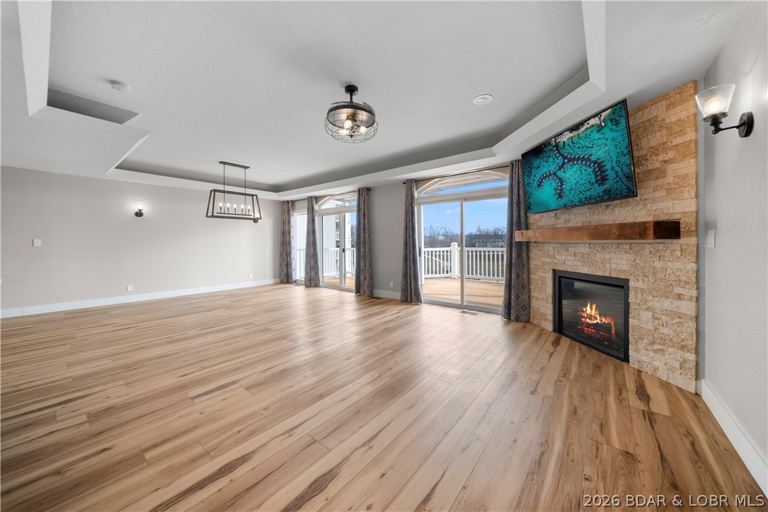 2180 Bittersweet Road Lake Ozark, MO 65049 - Photo 2 of 59 Stone Fireplace + Open Concept Living