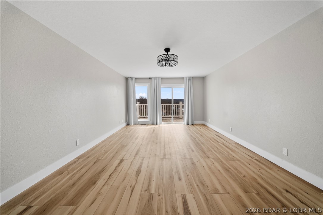 2180 Bittersweet Road Lake Ozark, MO 65049 - Photo 23 of 59 Master Bedroom