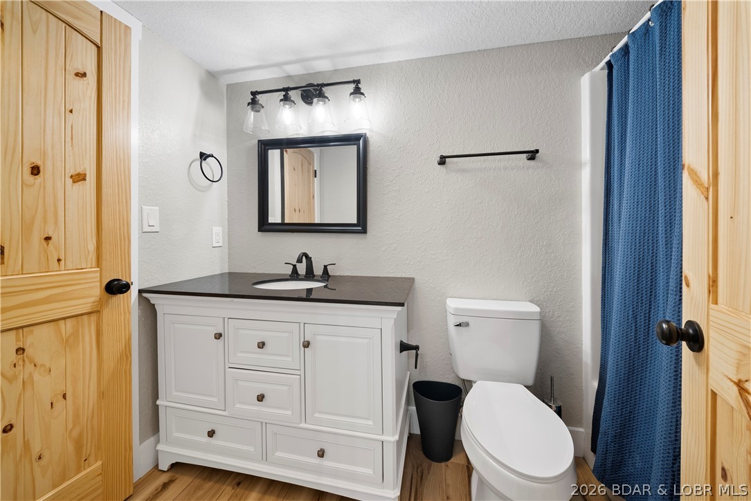 2180 Bittersweet Road Lake Ozark, MO 65049 - Photo 49 of 59 En-Suite Bathroom of Bedroom in Basement