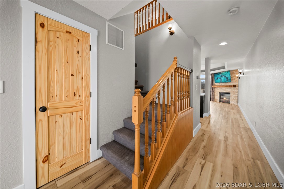 2180 Bittersweet Road Lake Ozark, MO 65049 - Photo 7 of 59 Entryway / Stairs to Upper Level