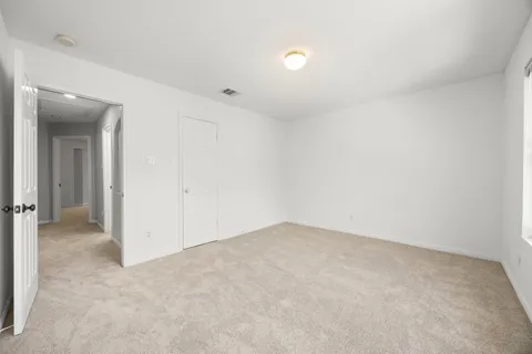 an empty room with an entryway