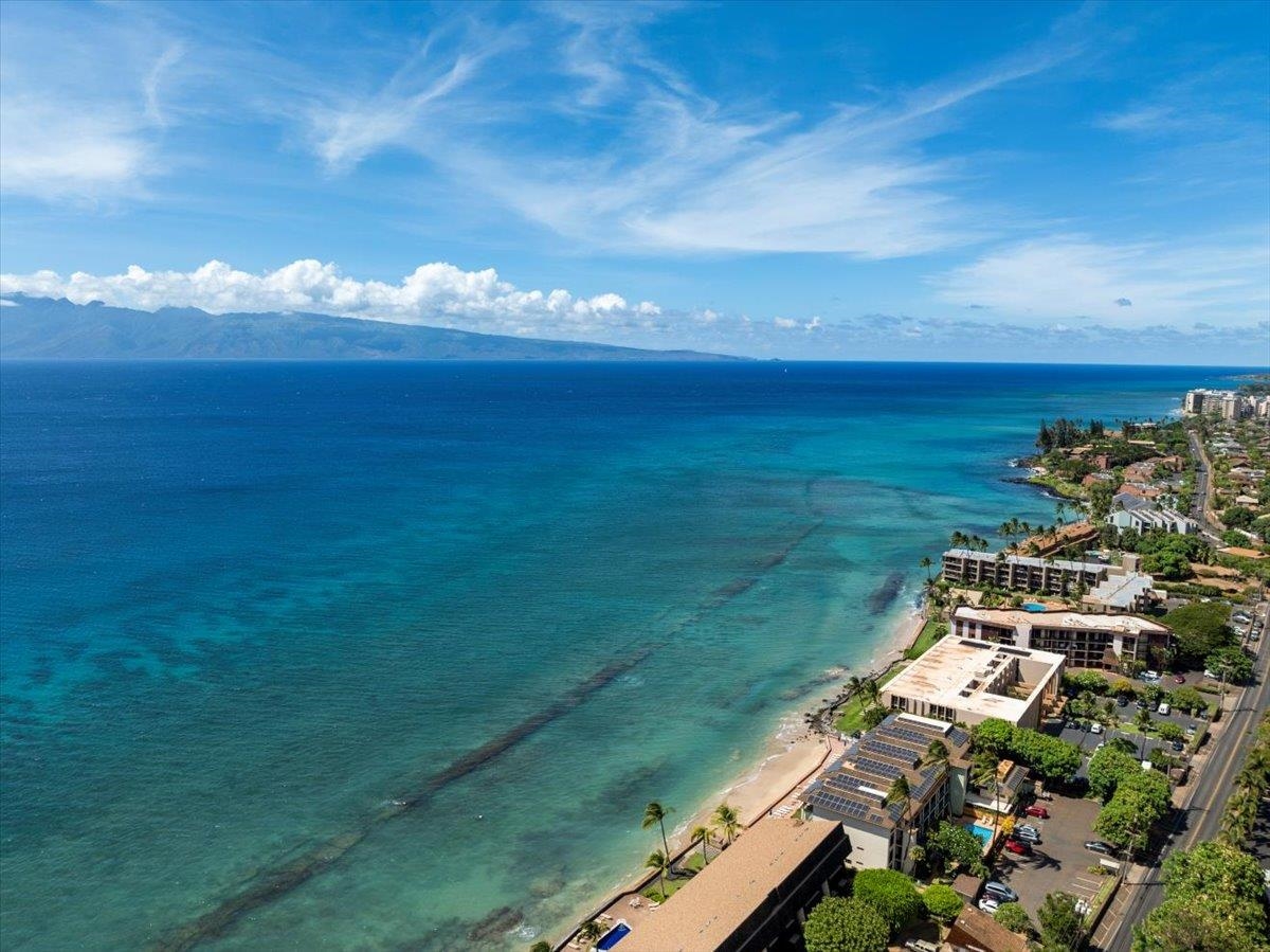 3740 Lower Honoapiilani Road, Unit E102 Lahaina, HI 96761 - Photo 2 of 41 a view of a lake with a big yard