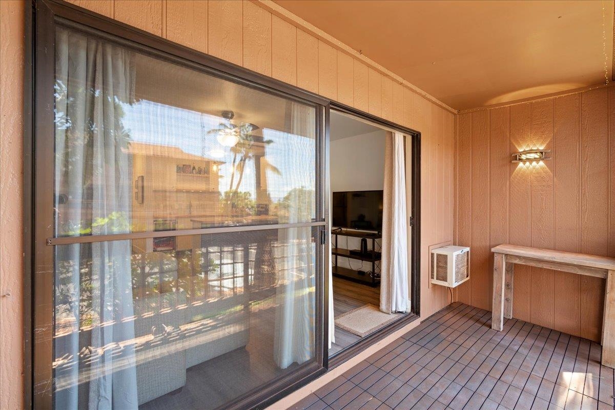 3740 Lower Honoapiilani Road, Unit E102 Lahaina, HI 96761 - Photo 29 of 41 a view of livingroom with furniture and wooden floor