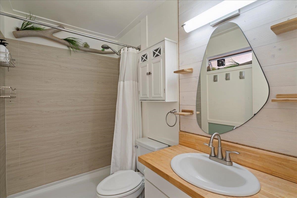 3740 Lower Honoapiilani Road, Unit E102 Lahaina, HI 96761 - Photo 38 of 41 a bathroom with a sink toilet and shower