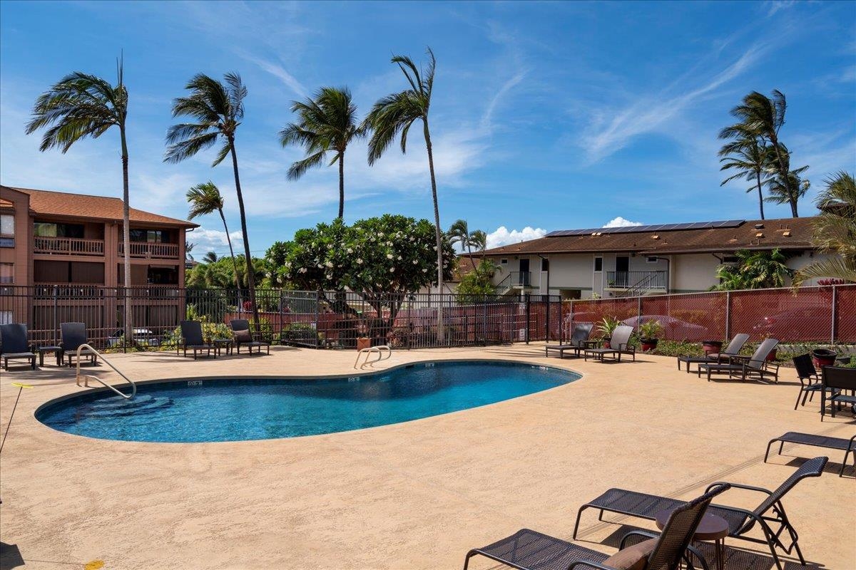 3740 Lower Honoapiilani Road, Unit E102 Lahaina, HI 96761 - Photo 41 of 41 a view of a swimming pool with a patio