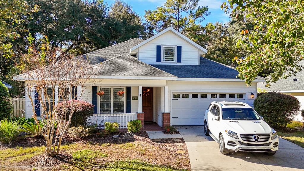 7572 Southwest 82nd Way Gainesville, FL 32608 - Photo 1 of 1 a car parked in front of a house