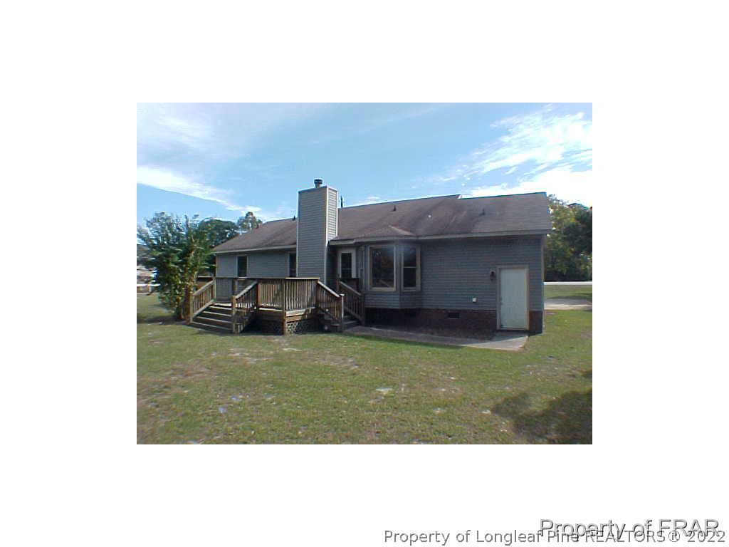 4546 Legion Road Hope Mills, NC 28348 - Photo 2 of 11 a house view with a outdoor space