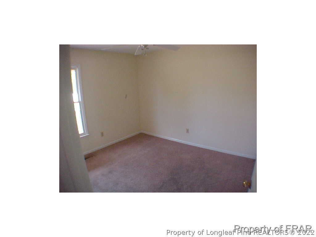 4546 Legion Road Hope Mills, NC 28348 - Photo 9 of 11 a view of an empty room