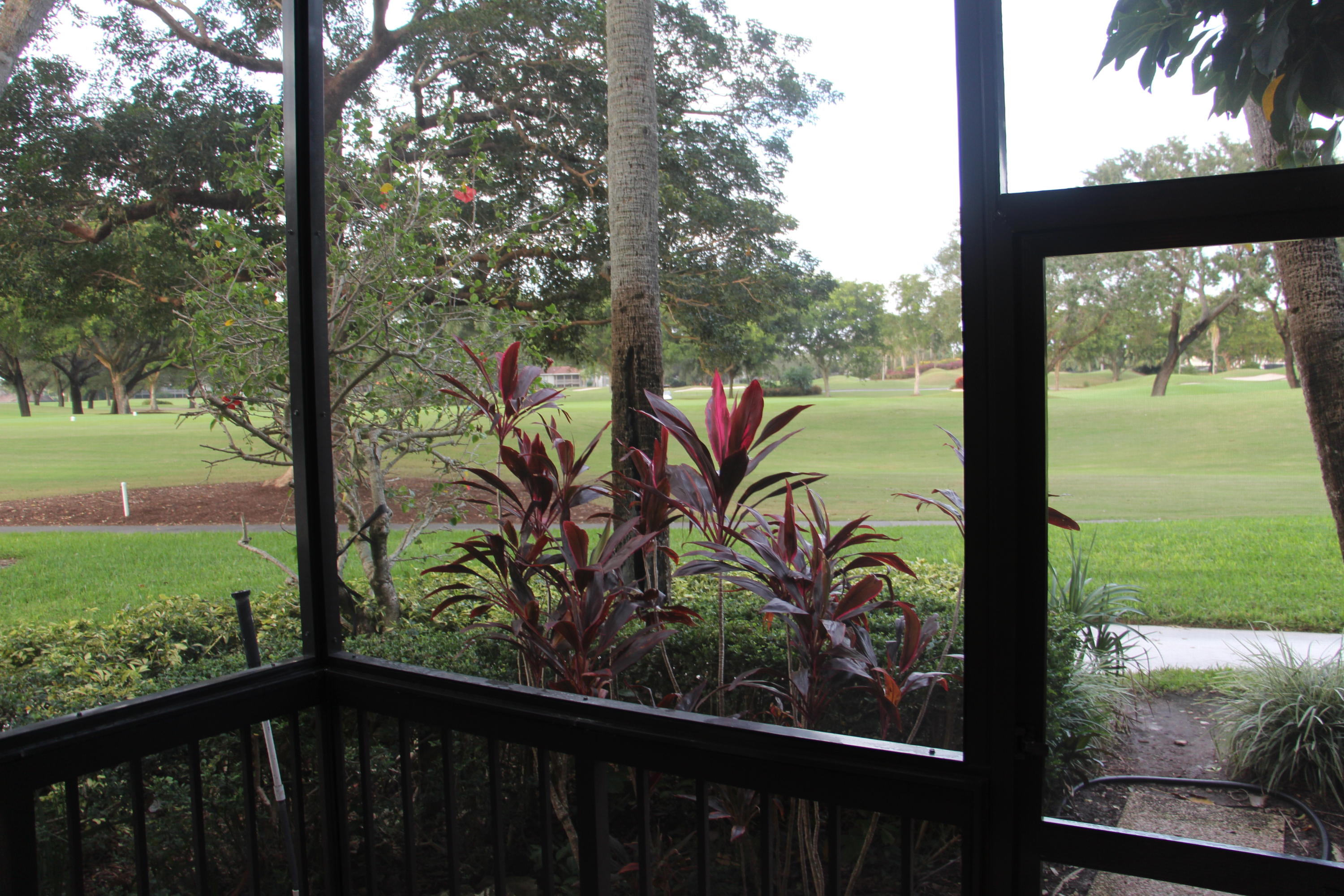 1912 Bridgewood Drive, Unit 1912 Boca Raton, FL 33434 - Photo 20 of 26 Kitchen Patio