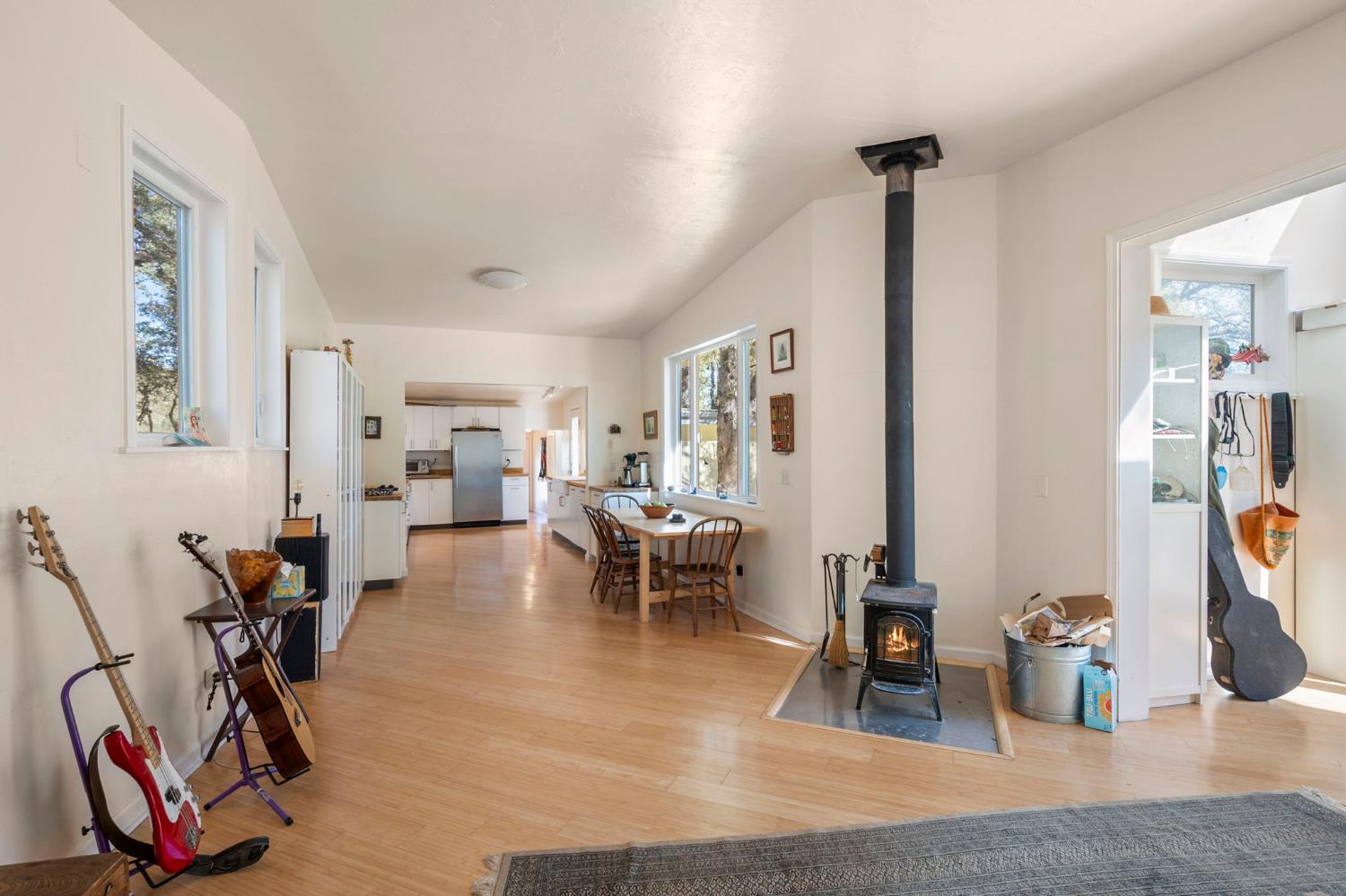 7123 Swiss Ranch Road Mountain Ranch, CA 95246 - Photo 16 of 66 a view of a livingroom with dining room and stairs