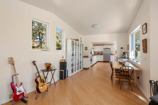 a very nice looking living room with furniture and a large window