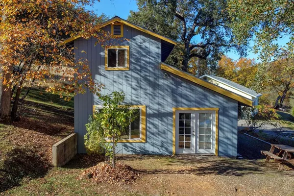a view of a house with a park