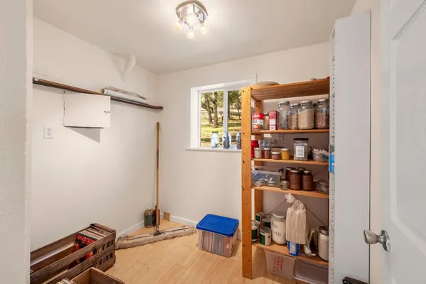 a view of a hallway with staircase
