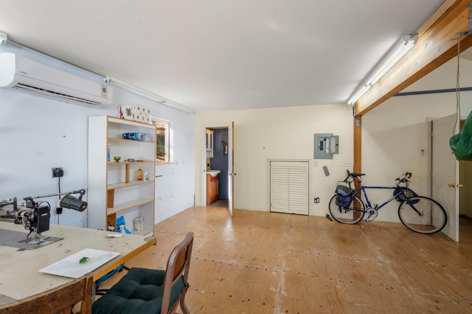 7123 Swiss Ranch Road Mountain Ranch, CA 95246 - Photo 47 of 66 a view of a livingroom with furniture and a workspace
