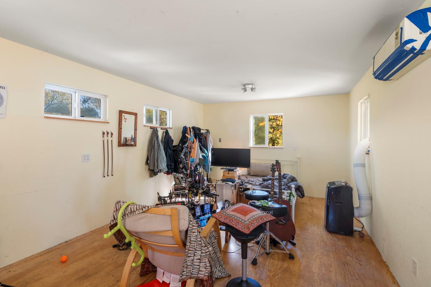 7123 Swiss Ranch Road Mountain Ranch, CA 95246 - Photo 49 of 66 a room with furniture and wooden floor