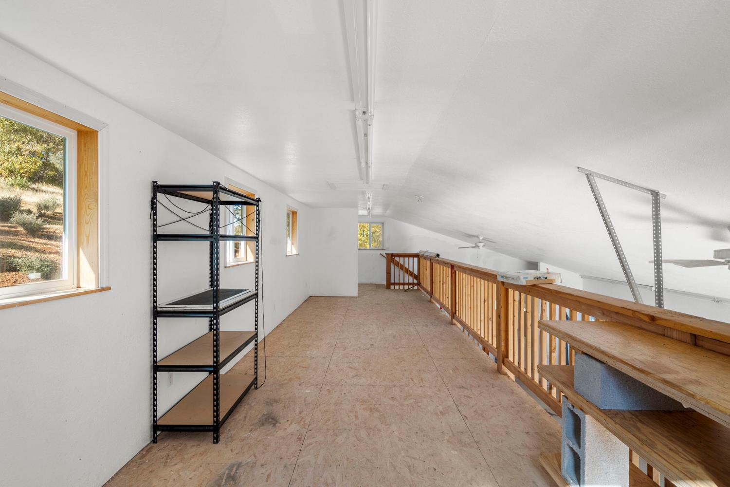 7123 Swiss Ranch Road Mountain Ranch, CA 95246 - Photo 55 of 66 a view of hallway with stairs and wooden floor