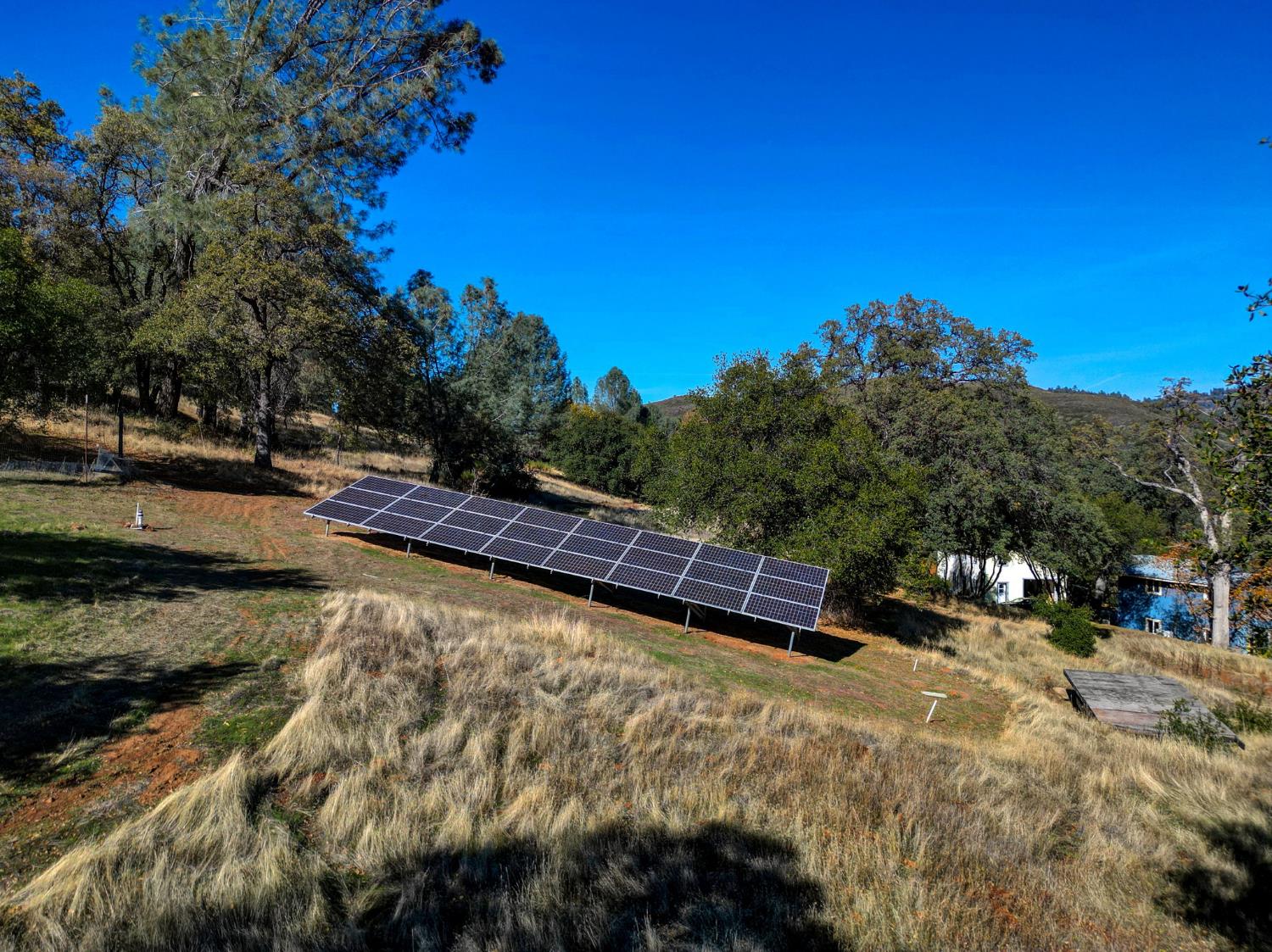 7123 Swiss Ranch Road Mountain Ranch, CA 95246 - Photo 6 of 66 a view of a yard with swimming pool