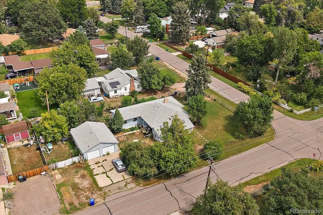 an aerial view of a city with lots of residential buildings