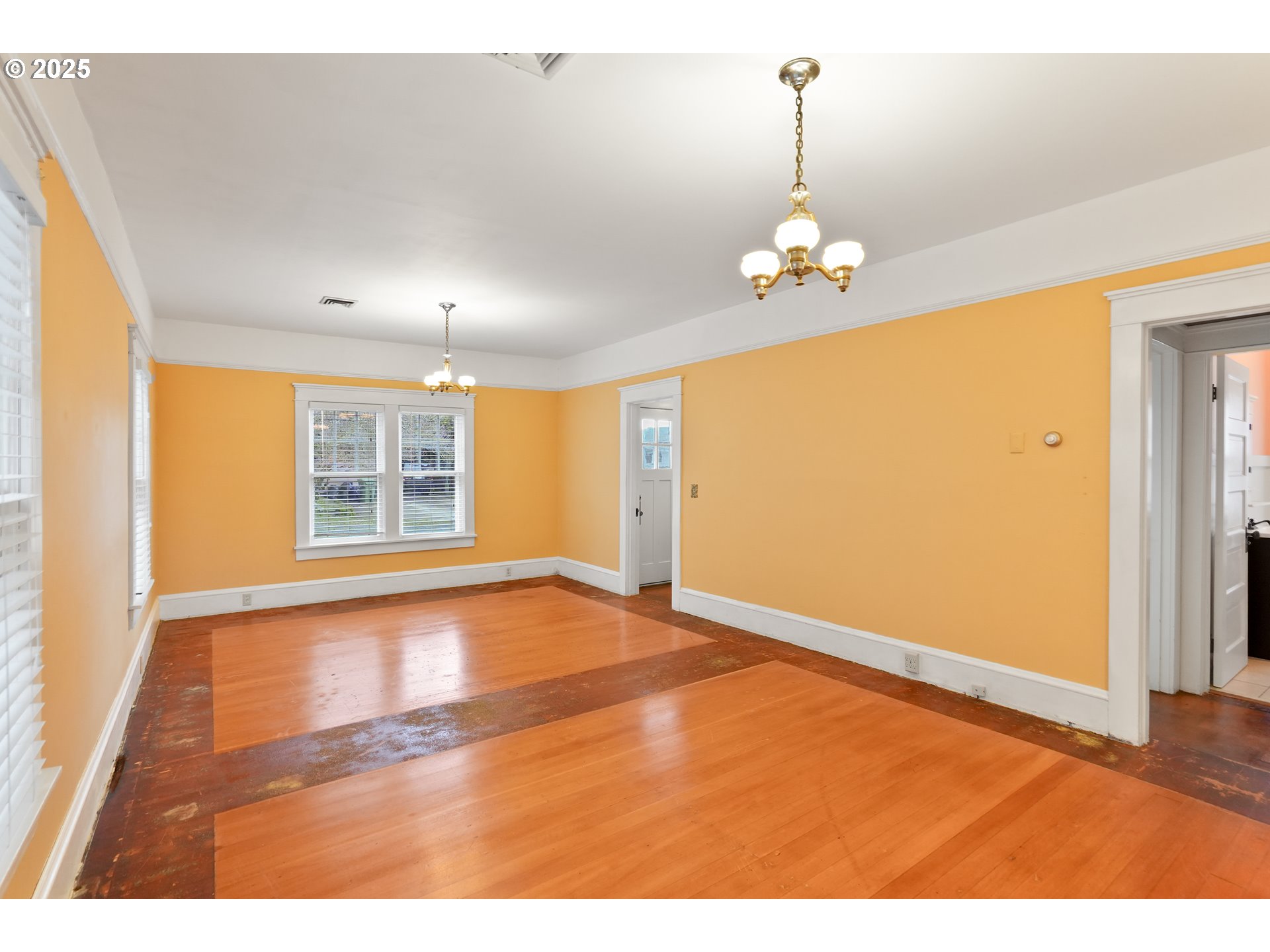 619 B Street Silverton, OR 97381 - Photo 11 of 42 a view of an empty room with a window