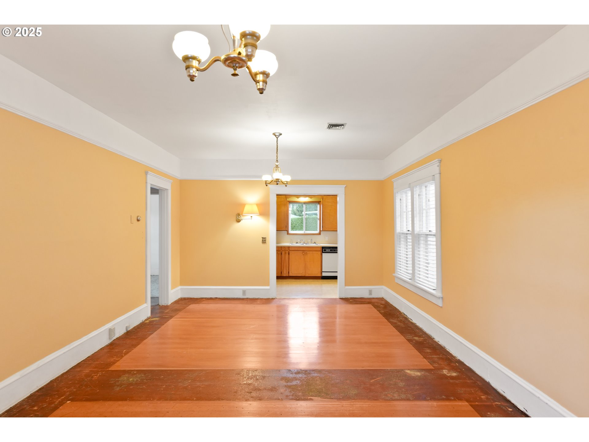 619 B Street Silverton, OR 97381 - Photo 12 of 42 a view of an empty room with a window