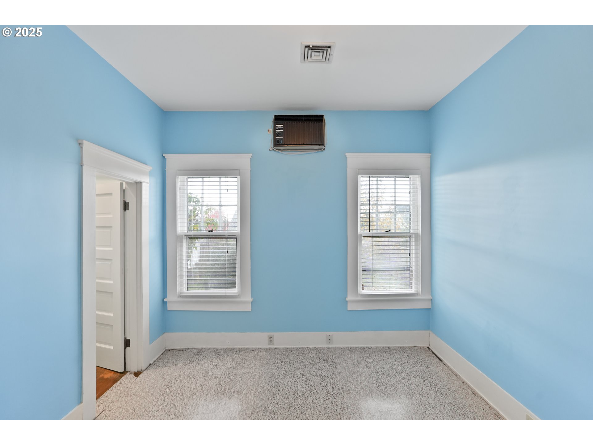 619 B Street Silverton, OR 97381 - Photo 17 of 42 a view of an empty room with a window