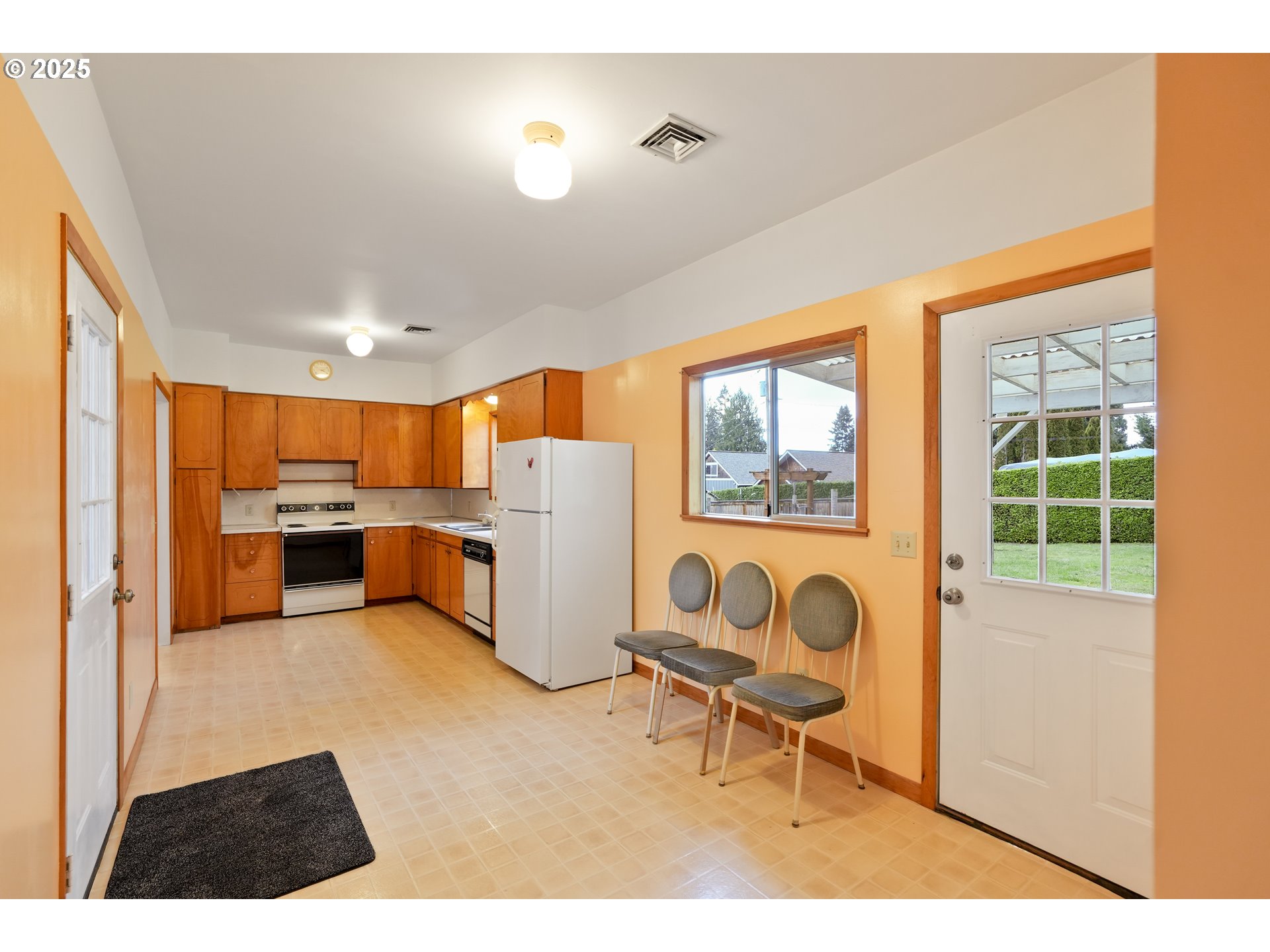619 B Street Silverton, OR 97381 - Photo 23 of 42 a view of kitchen with furniture and refrigerator