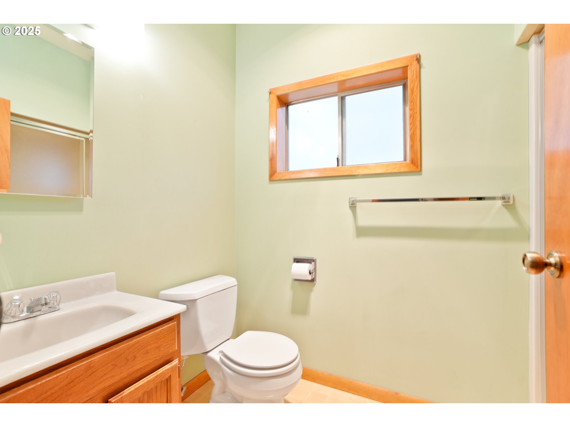 619 B Street Silverton, OR 97381 - Photo 24 of 42 a bathroom with a sink a toilet and a mirror