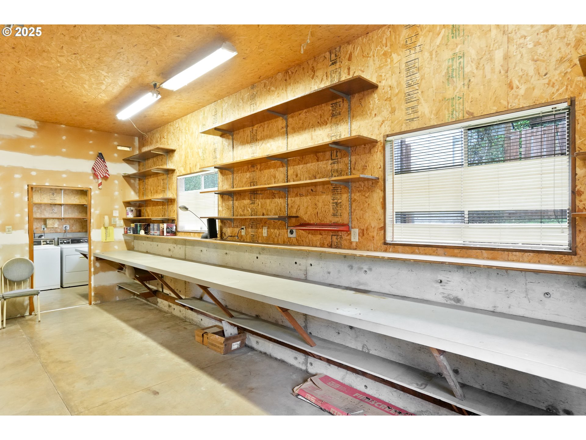 619 B Street Silverton, OR 97381 - Photo 27 of 42 a living room with a table and chair with wooden floor