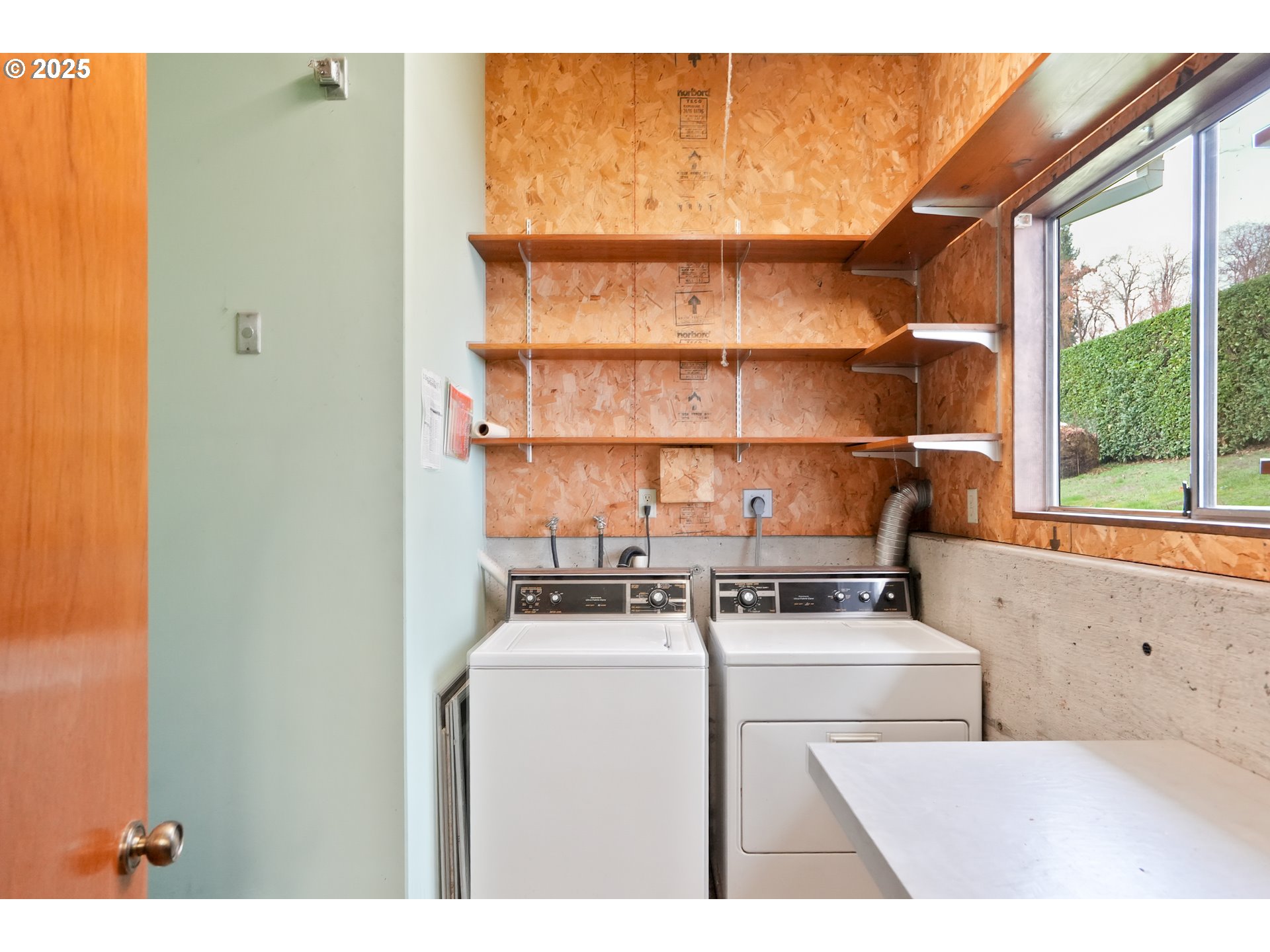 619 B Street Silverton, OR 97381 - Photo 28 of 42 a room with storage and utility