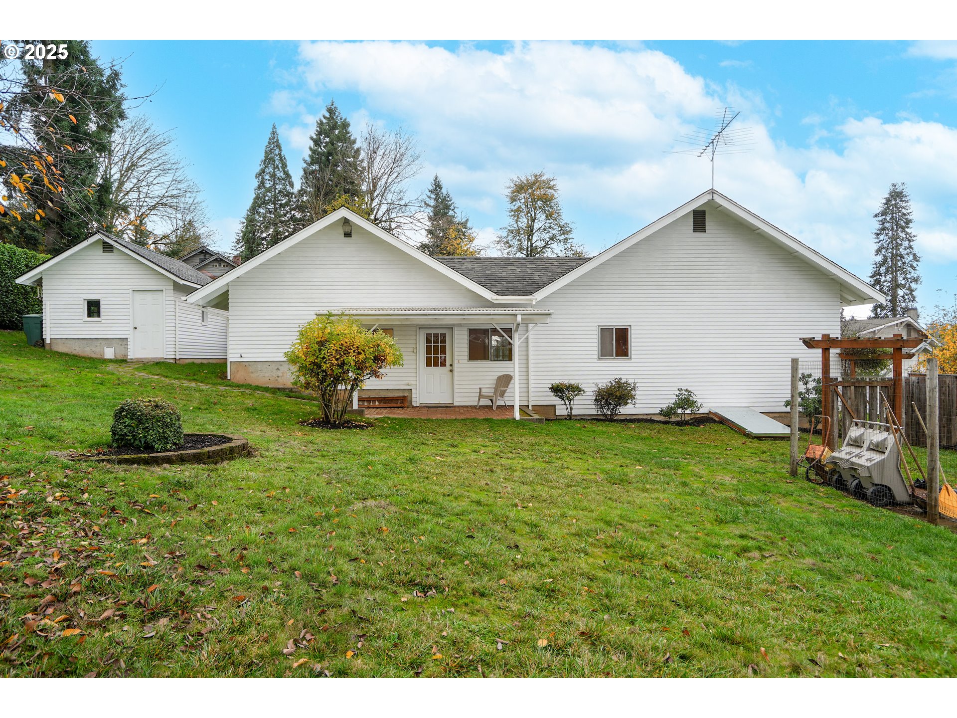619 B Street Silverton, OR 97381 - Photo 34 of 42 a view of a house with a back yard